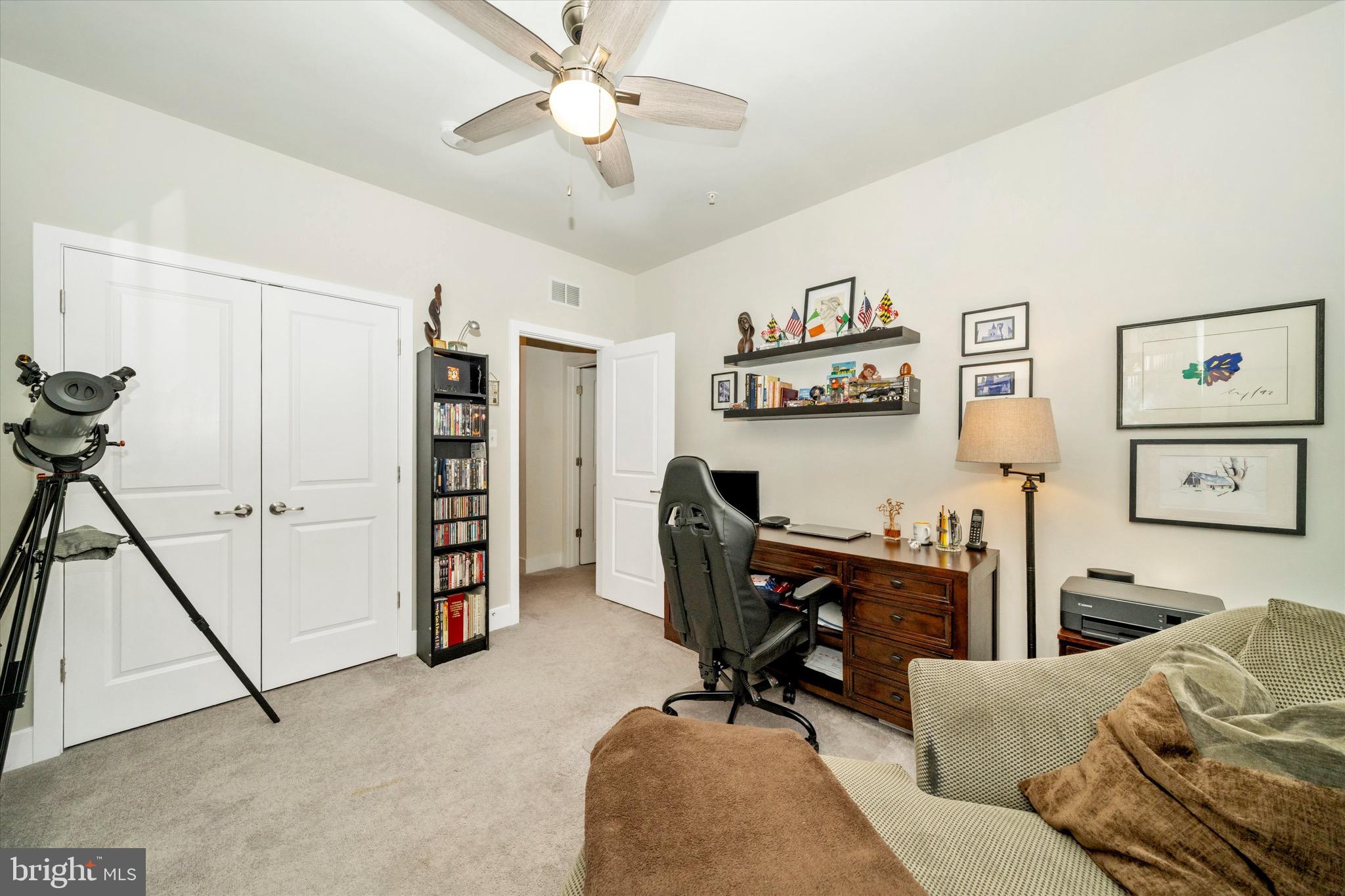 7920 Potter Place, Unit 920B Elkridge, MD 21075 - Photo 36 of 57 a view of a livingroom with workspace and a couch