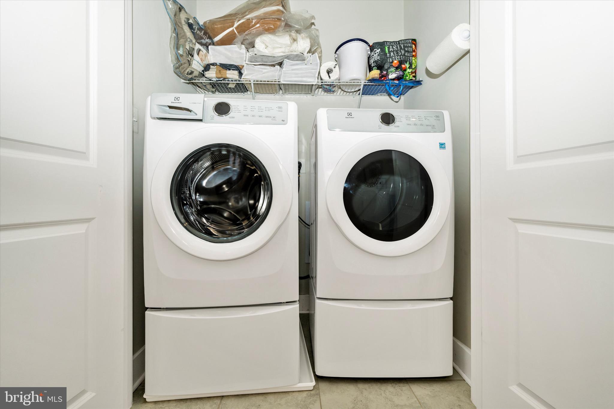7920 Potter Place, Unit 920B Elkridge, MD 21075 - Photo 42 of 57 a utility room with dryer and washer