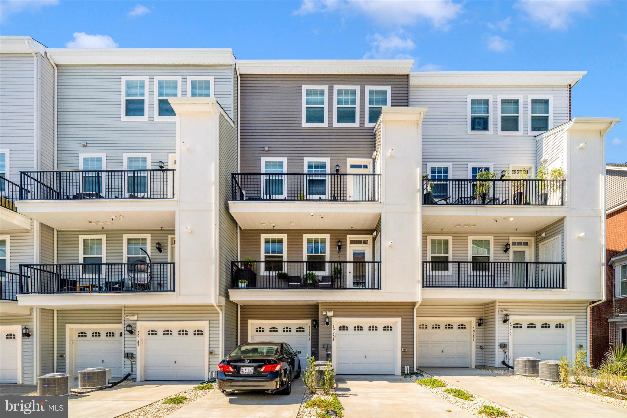 7920 Potter Place, Unit 920B Elkridge, MD 21075 - Photo 51 of 57 a car parked in front of a building