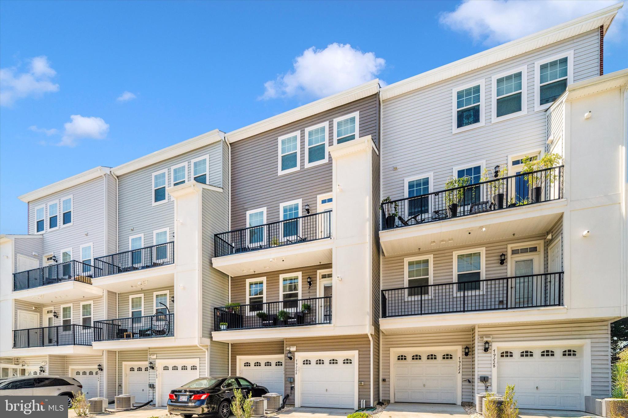7920 Potter Place, Unit 920B Elkridge, MD 21075 - Photo 52 of 57 a front view of a building with glass windows