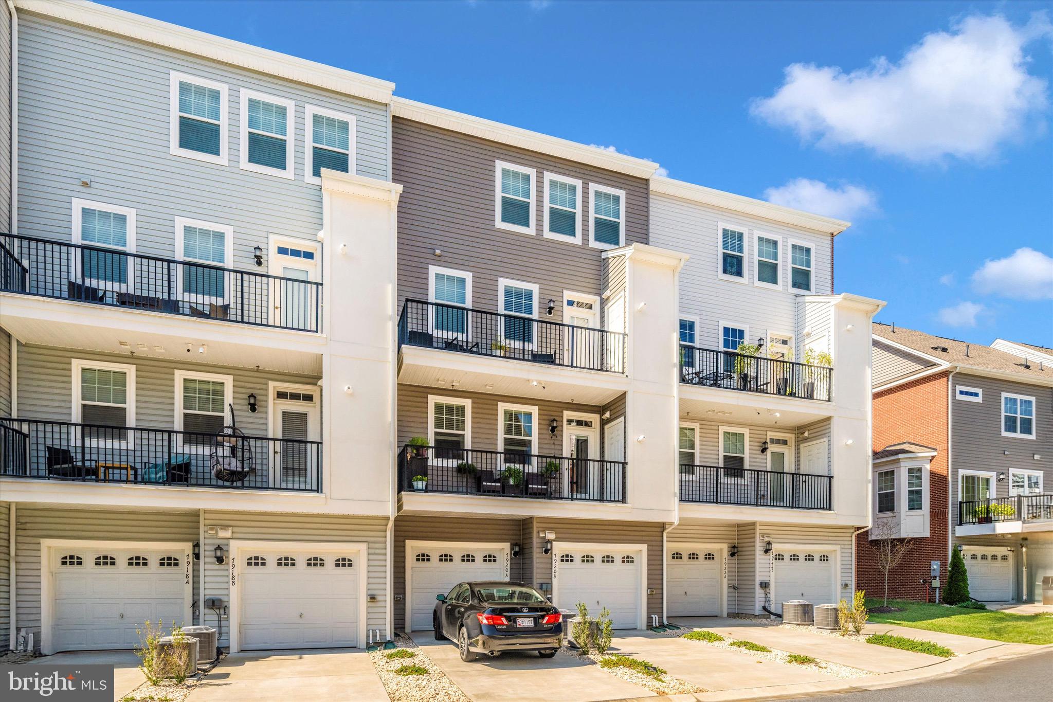 7920 Potter Place, Unit 920B Elkridge, MD 21075 - Photo 53 of 57 a front view of a building with a street