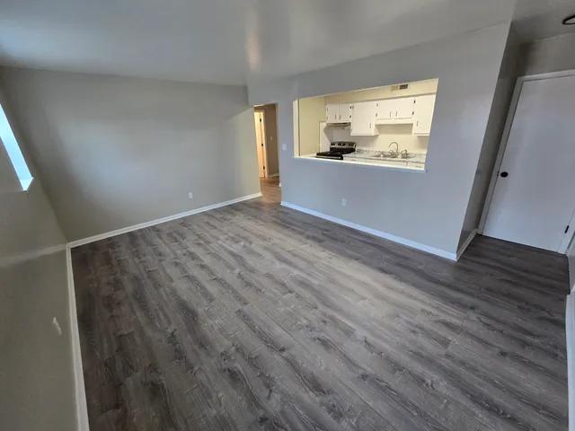 a view of a kitchen from the hallway