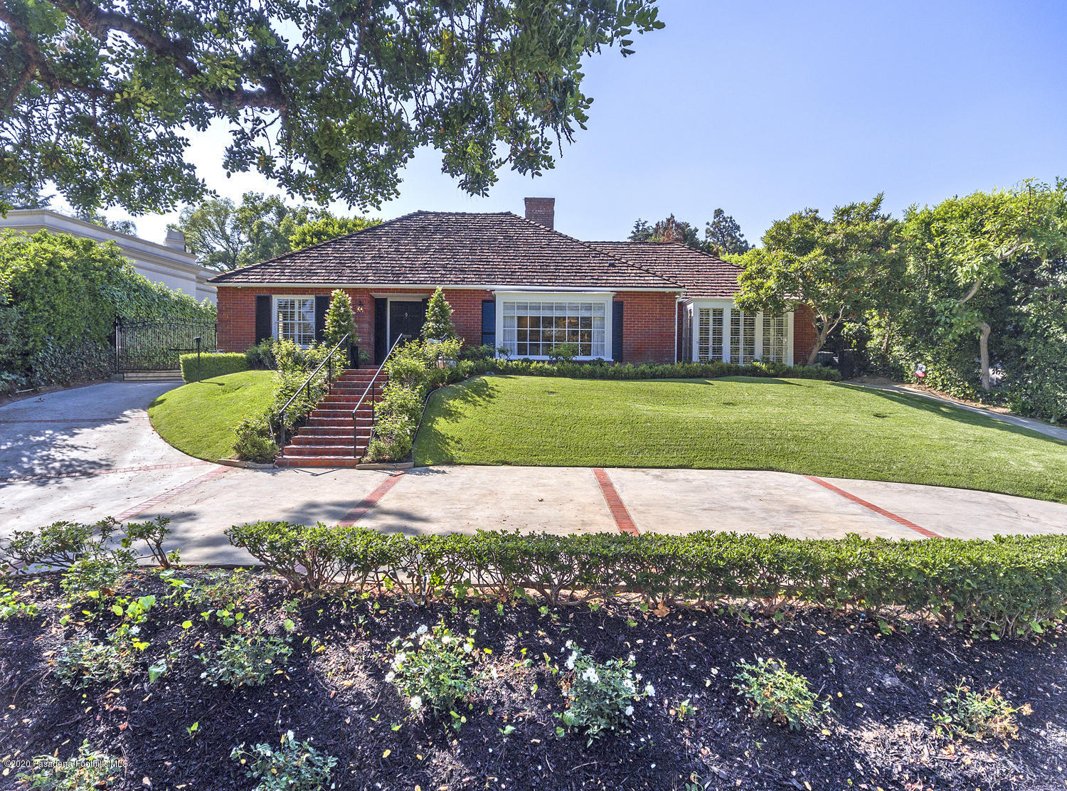 1175 Arden Road Pasadena, CA 91106 - Photo 2 of 30 a front view of a house with a yard and garage