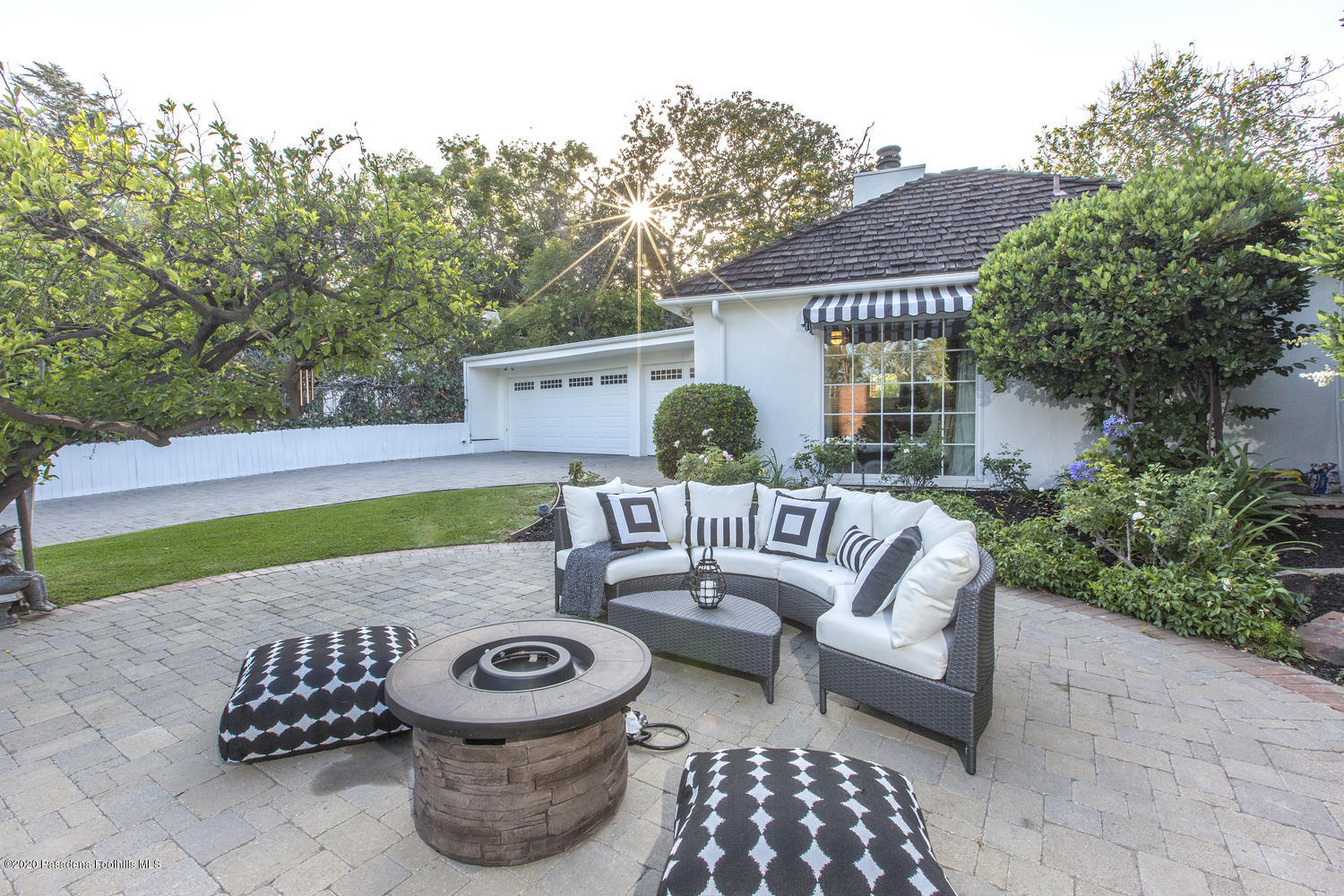 1175 Arden Road Pasadena, CA 91106 - Photo 19 of 30 a view of a patio with couches table and chairs and potted plants
