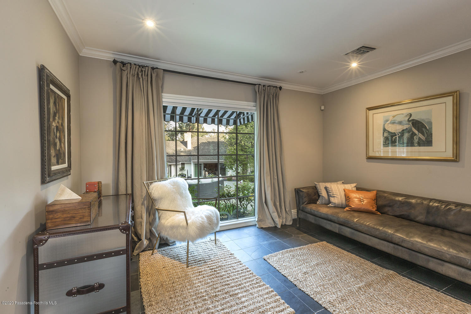 1175 Arden Road Pasadena, CA 91106 - Photo 25 of 30 a living room with furniture and a window
