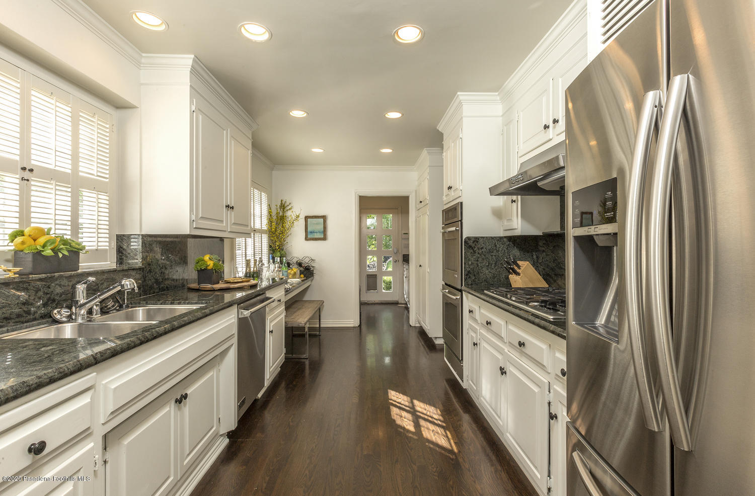 1175 Arden Road Pasadena, CA 91106 - Photo 4 of 30 a large kitchen with stainless steel appliances a stove a sink and a refrigerator