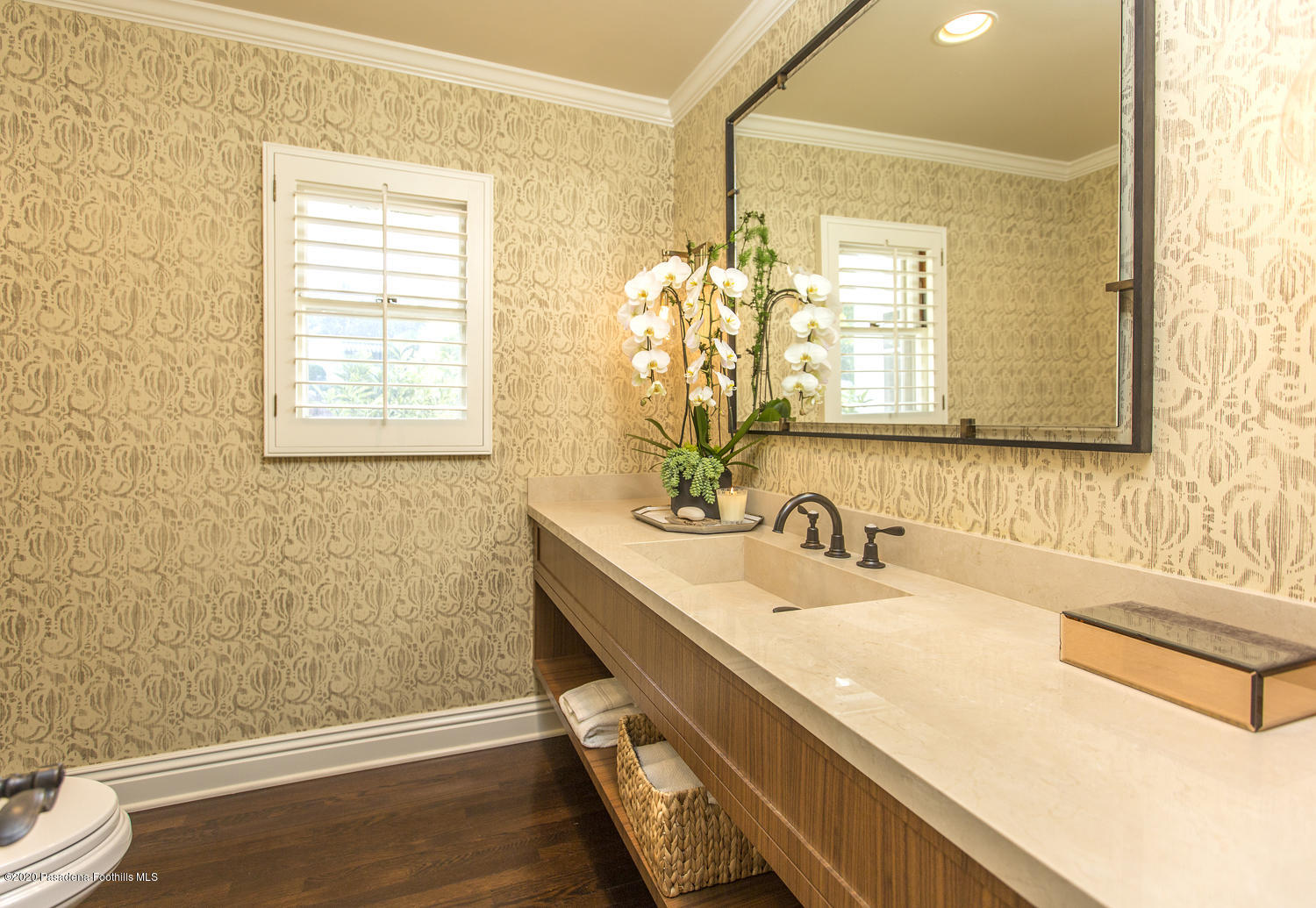1175 Arden Road Pasadena, CA 91106 - Photo 10 of 30 a bathroom with a sink and a mirror