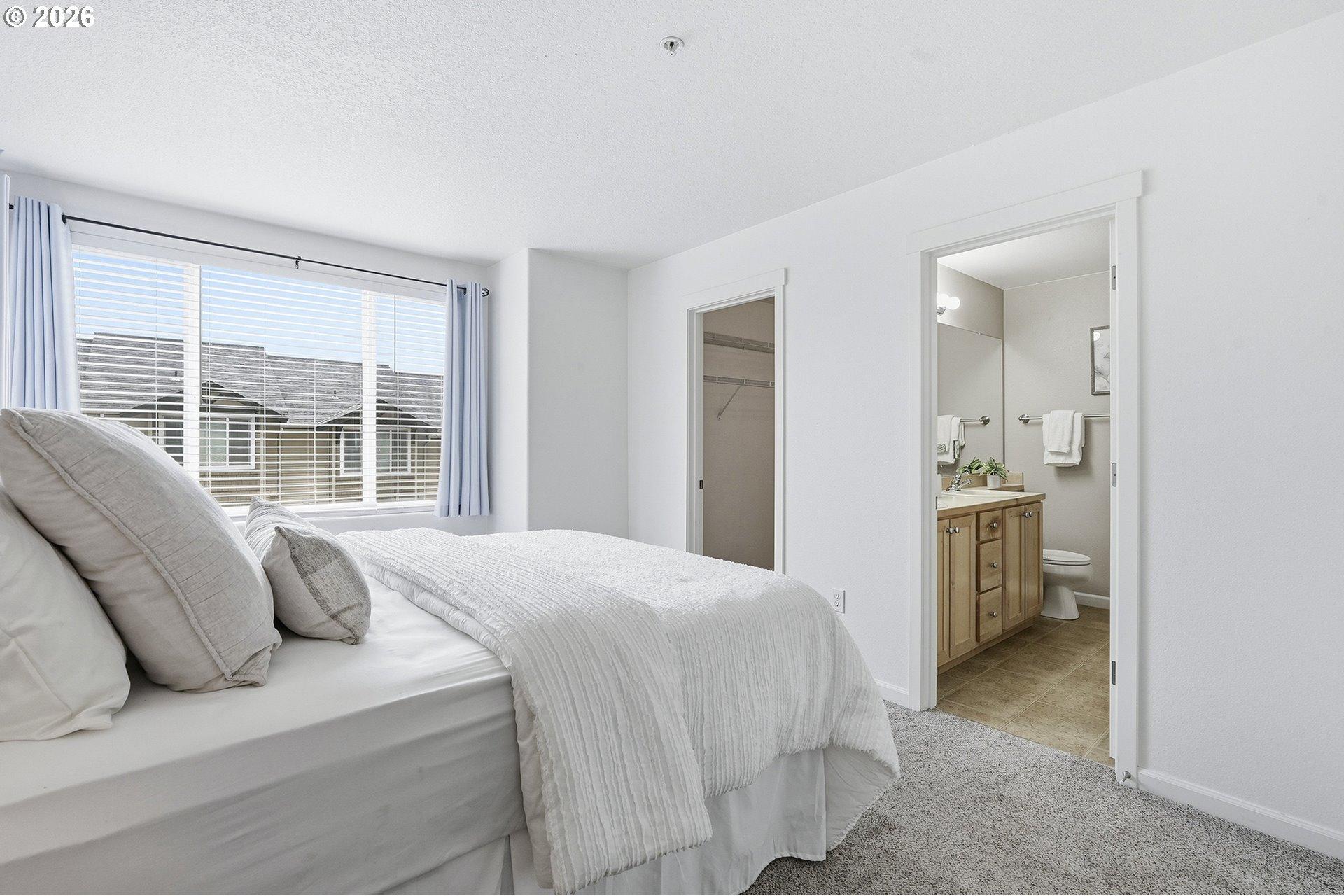 15430 Southwest Sparrow Loop, Unit 105 Beaverton, OR 97007 - Photo 24 of 43 Primary Bedroom