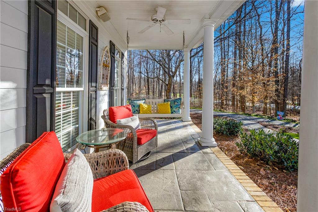 7999 Witty Road Summerfield, NC 27358 - Photo 5 of 50 Side of porch closest to driveway