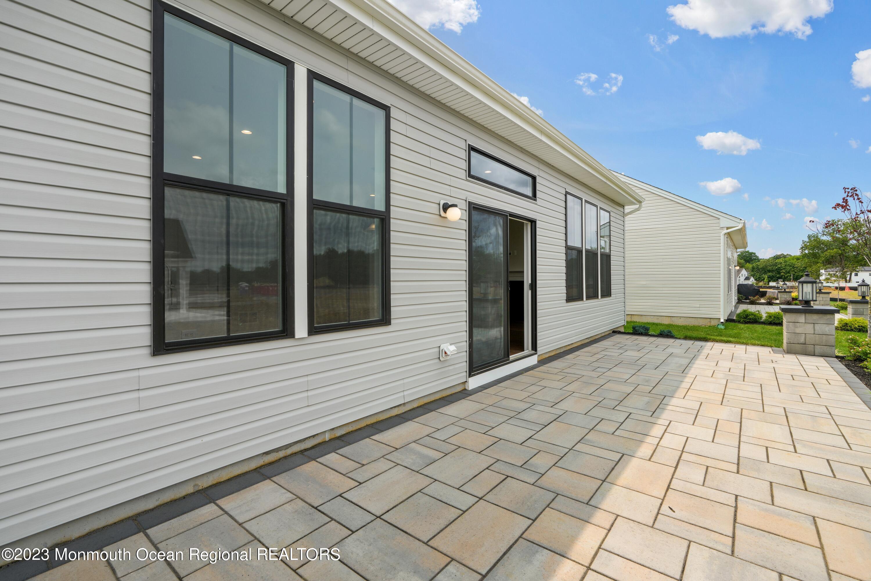 6 Salkin Way Freehold, NJ 07728 - Photo 14 of 14 a view of a house with a yard