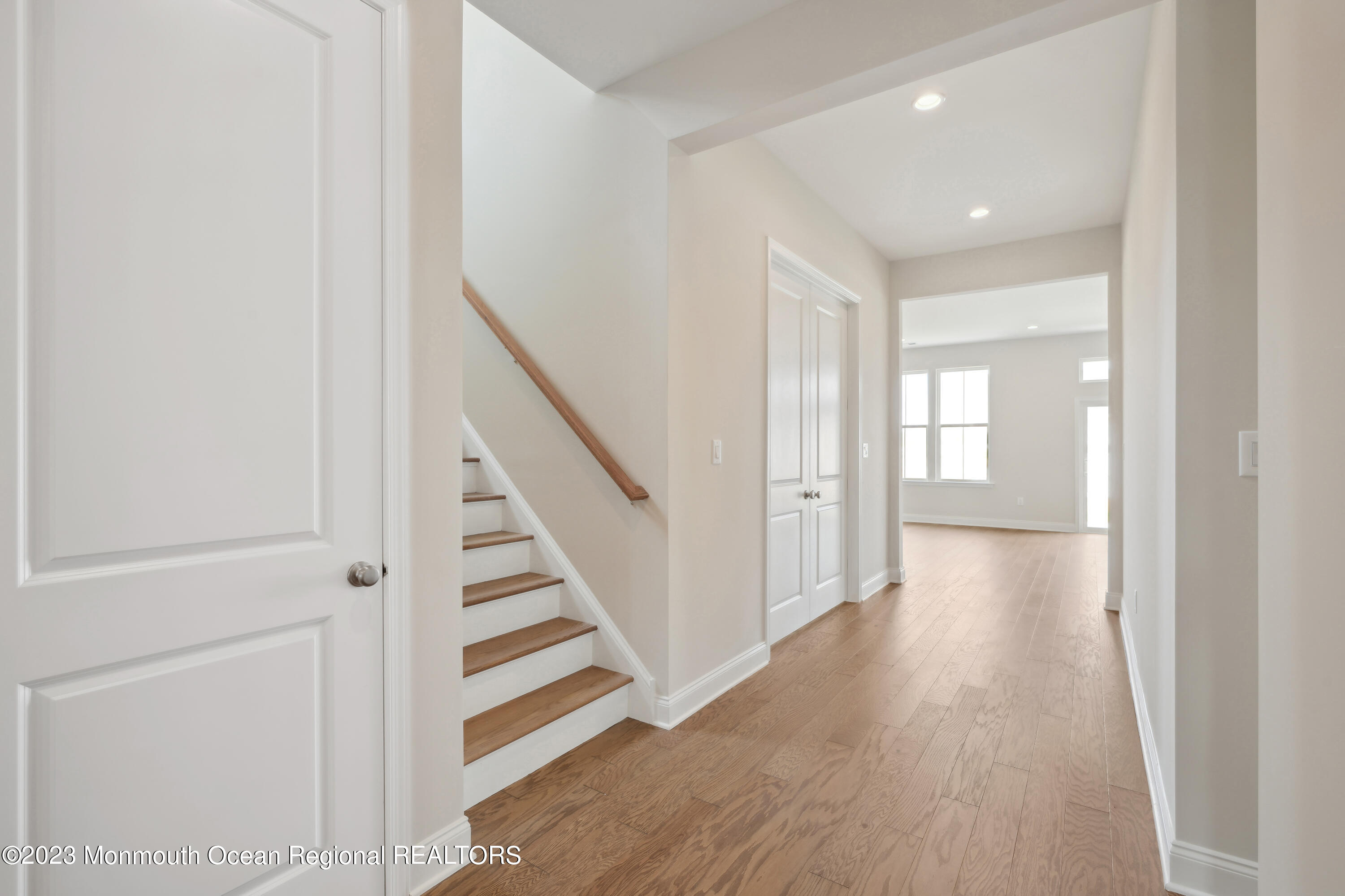 6 Salkin Way Freehold, NJ 07728 - Photo 2 of 14 a view of a hallway with wooden floor and entryway