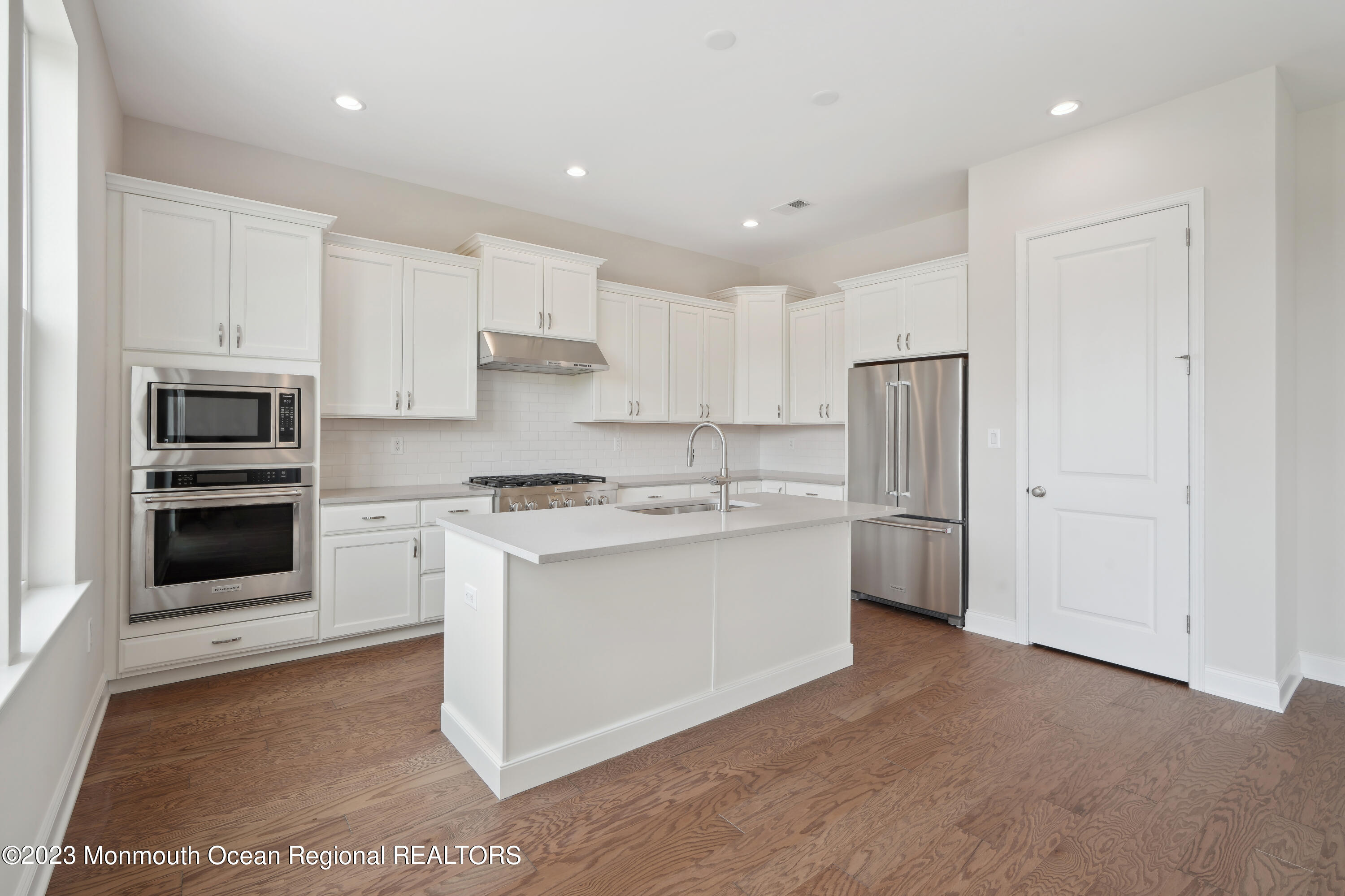 6 Salkin Way Freehold, NJ 07728 - Photo 5 of 14 a kitchen with stainless steel appliances granite countertop a stove a sink and a refrigerator