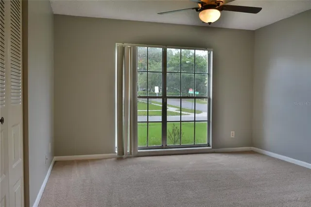 an empty room with windows