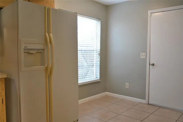 a view of an empty room with window