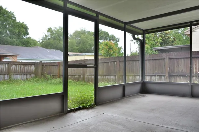 a view of a porch with a yard