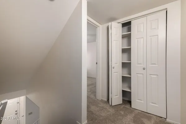 an empty room with closet