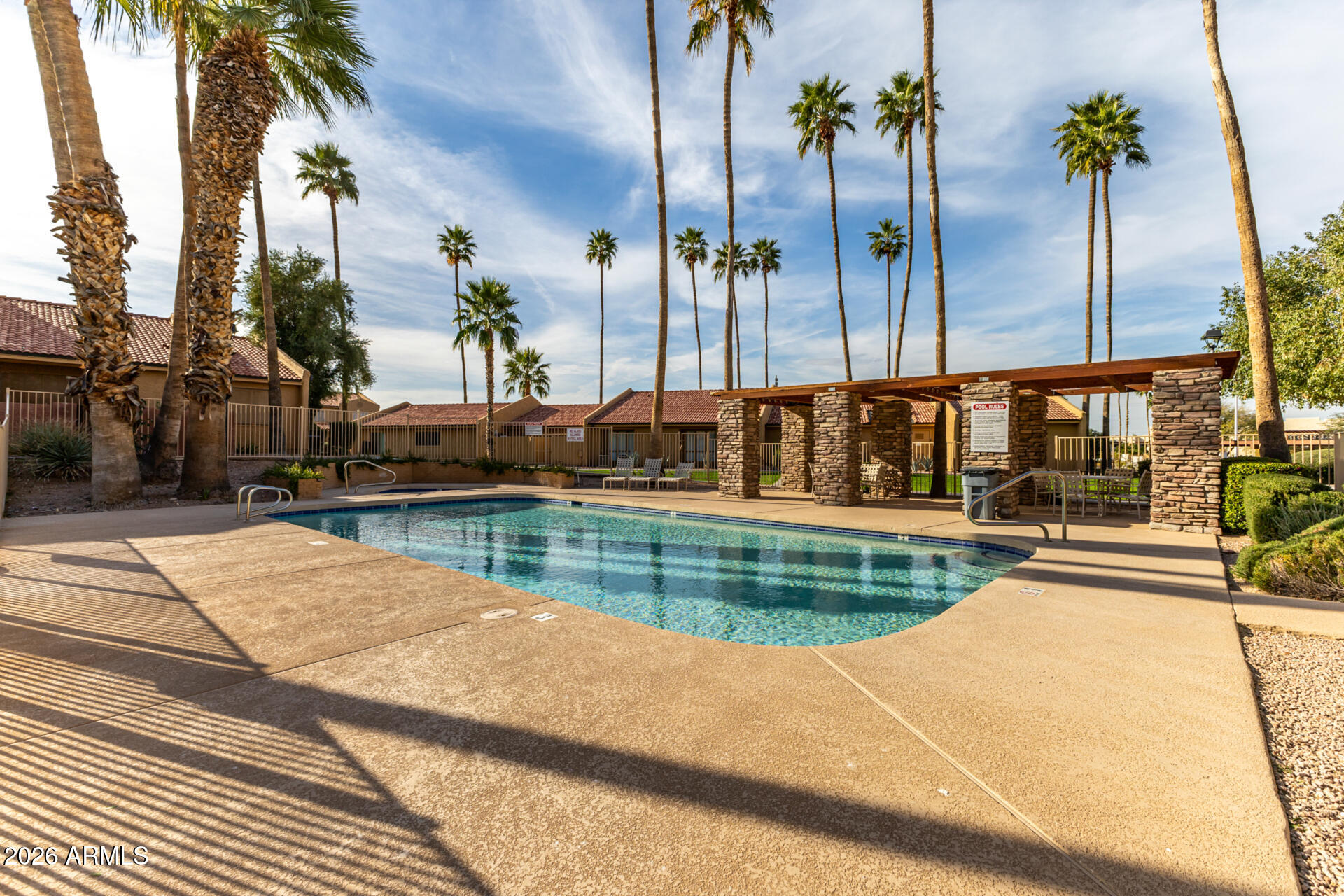 3511 East Baseline Road, Unit 1249 Phoenix, AZ 85042 - Photo 21 of 29 Pool Area/ Just Outside the Front Door