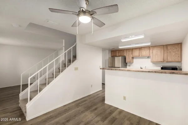 a view of cabinets and wooden floor