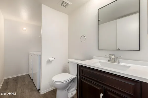 a bathroom with a sink and a toilet
