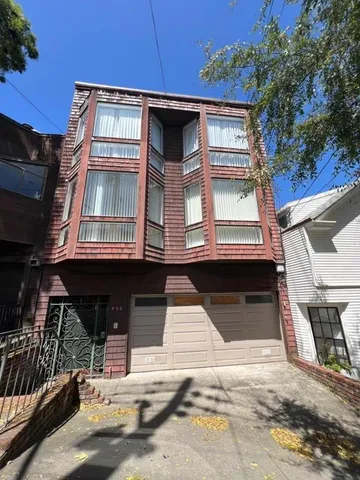a view of a house with a garage