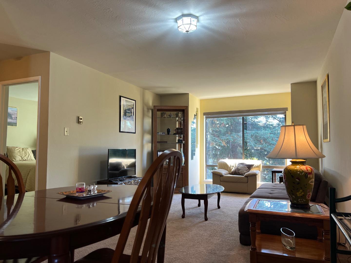 426 Arkansas Street, Unit 2 San Francisco, CA 94107 - Photo 4 of 13 a view of a workspace with furniture and a window
