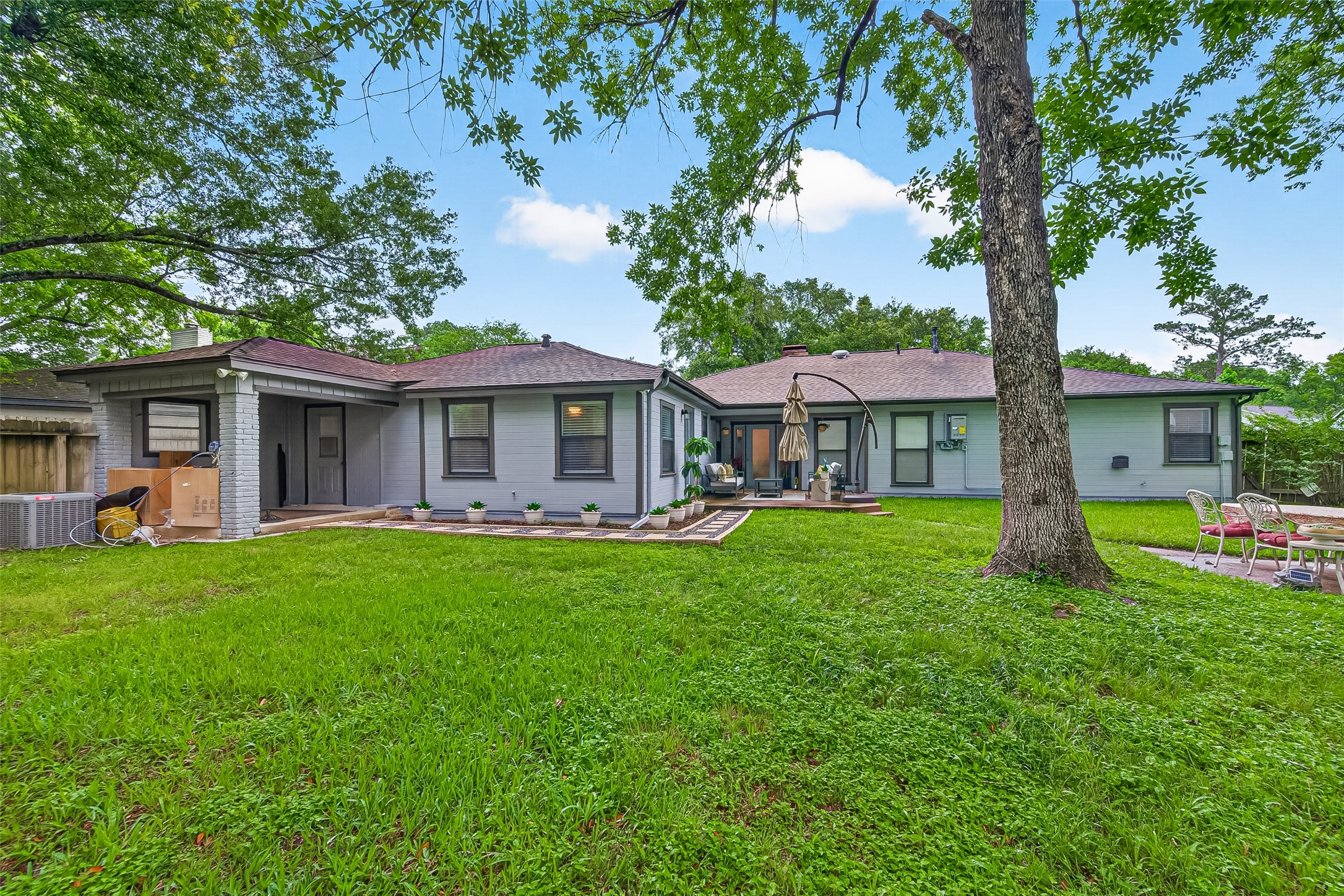 548 Brandon Road Conroe, TX 77302 - Photo 33 of 37 Fully fenced backyard with covered patio
