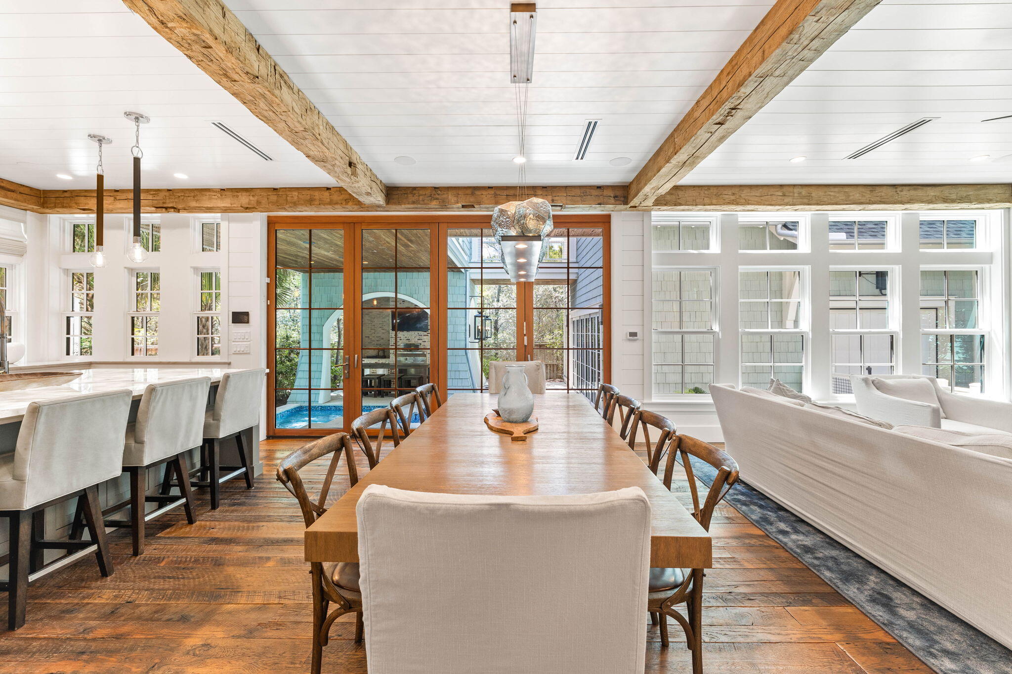 58 Coopersmith Ln Inlet Beach Inlet Beach, FL 32461 - Photo 14 of 130 a dining room with furniture a chandelier and wooden floor