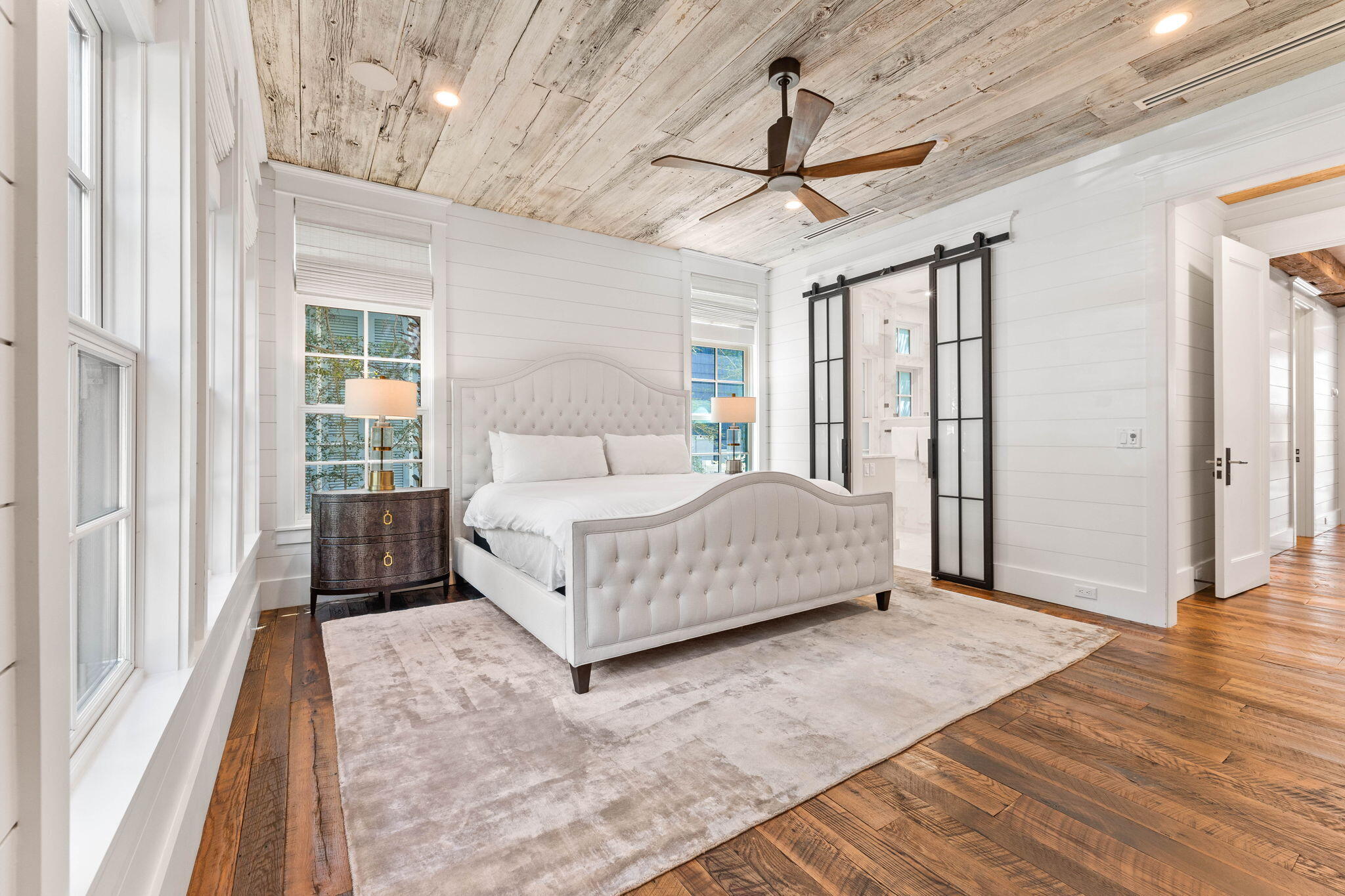 58 Coopersmith Ln Inlet Beach Inlet Beach, FL 32461 - Photo 59 of 130 a bedroom with a large bed wooden floor and window