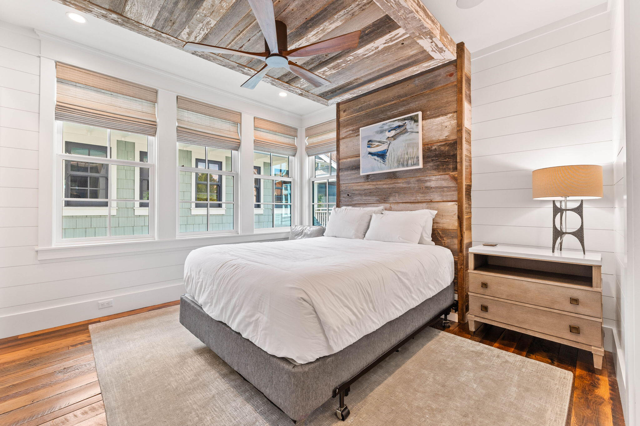 58 Coopersmith Ln Inlet Beach Inlet Beach, FL 32461 - Photo 64 of 130 a bedroom with a large bed and a chandelier