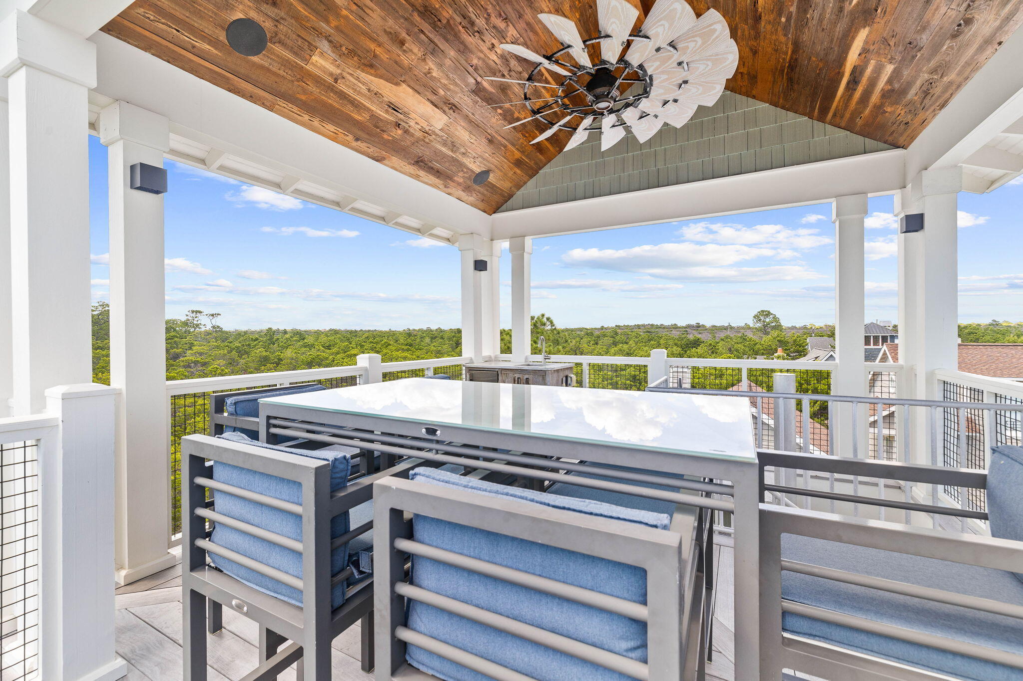 58 Coopersmith Ln Inlet Beach Inlet Beach, FL 32461 - Photo 90 of 130 a view of a balcony with floor to ceiling windows with wooden floor