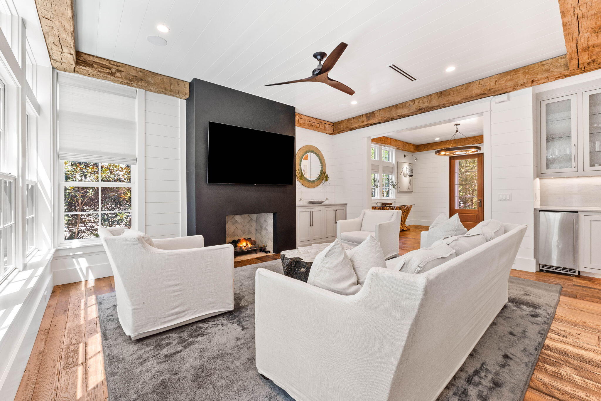 58 Coopersmith Ln Inlet Beach Inlet Beach, FL 32461 - Photo 10 of 130 a living room with furniture a flat screen tv and a fireplace