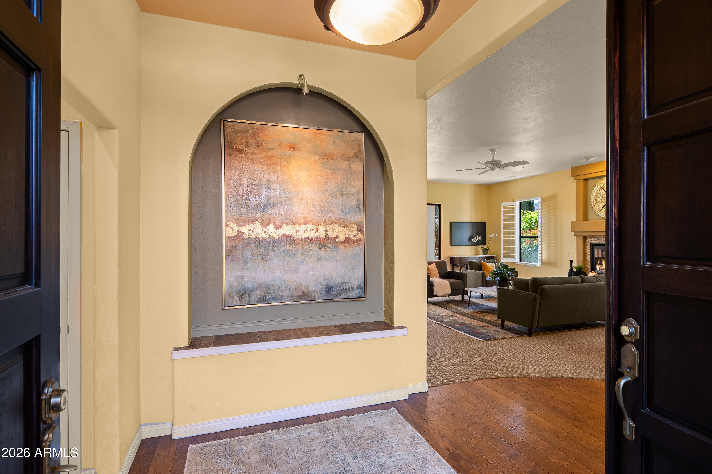 39 Rim Trail Circle Sedona, AZ 86351 - Photo 5 of 41 a living room with furniture and a fireplace