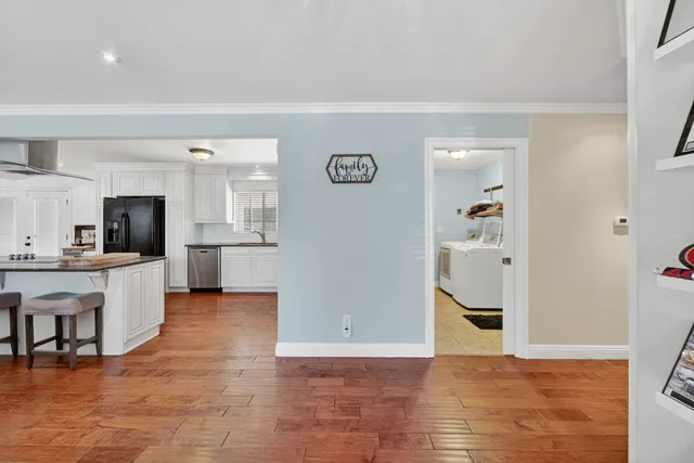 a view of a kitchen with a sink