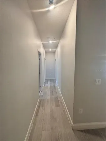 a view of hallway with stairs