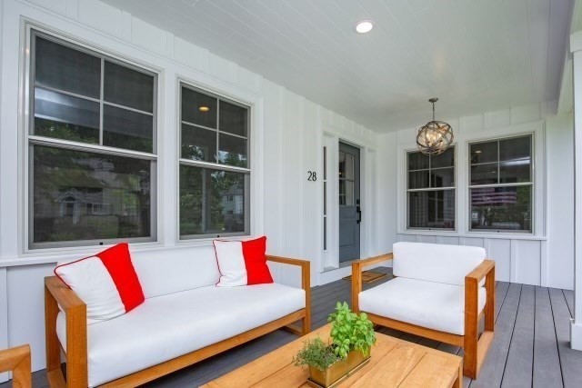 28 Rose Avenue Marblehead, MA 01945 - Photo 29 of 31 a living room with furniture and a large window