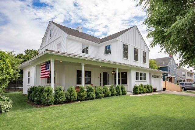 28 Rose Avenue Marblehead, MA 01945 - Photo 31 of 31 a front view of a house with a yard and garage