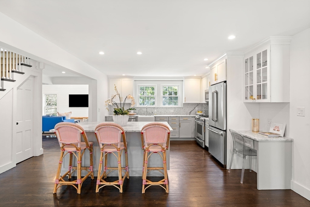 28 Rose Avenue Marblehead, MA 01945 - Photo 6 of 31 a view of a dining room with furniture and wooden floor
