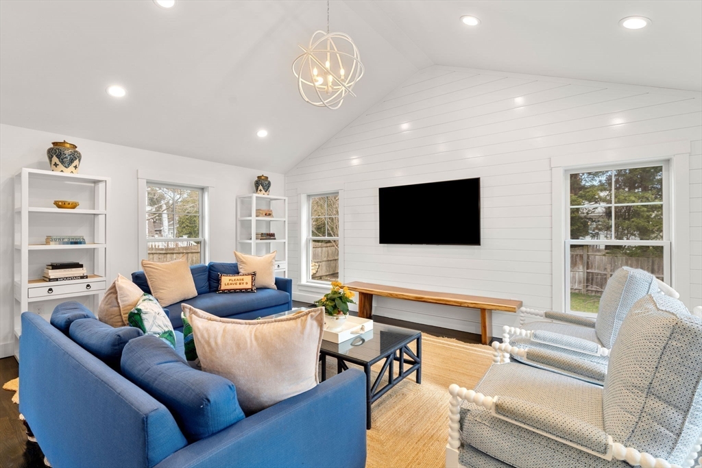 28 Rose Avenue Marblehead, MA 01945 - Photo 10 of 31 a living room with furniture and a flat screen tv