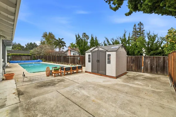 a view of a outdoor space with a patio