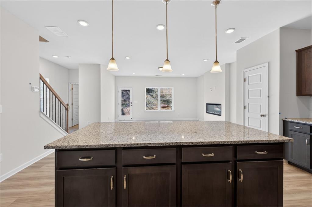 224 Bastian Drive, Unit 116 Villa Rica, GA 30180 - Photo 12 of 33 a kitchen with a counter space a sink and cabinets