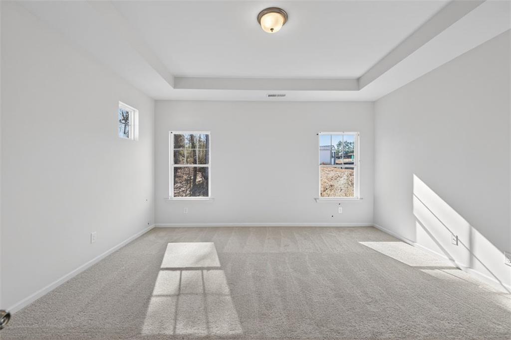 224 Bastian Drive, Unit 116 Villa Rica, GA 30180 - Photo 23 of 33 an empty room with windows