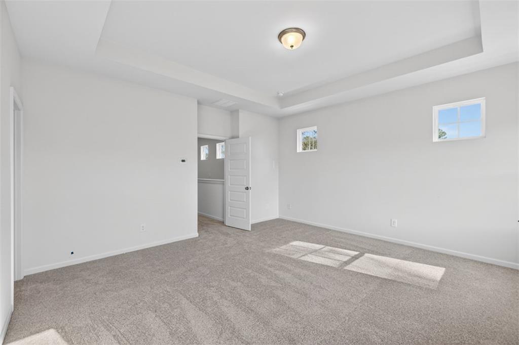 224 Bastian Drive, Unit 116 Villa Rica, GA 30180 - Photo 25 of 33 an empty room with an entryway