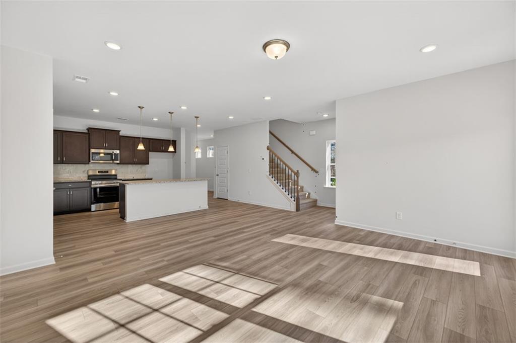 224 Bastian Drive, Unit 116 Villa Rica, GA 30180 - Photo 3 of 33 a view of kitchen with sink and refrigerator