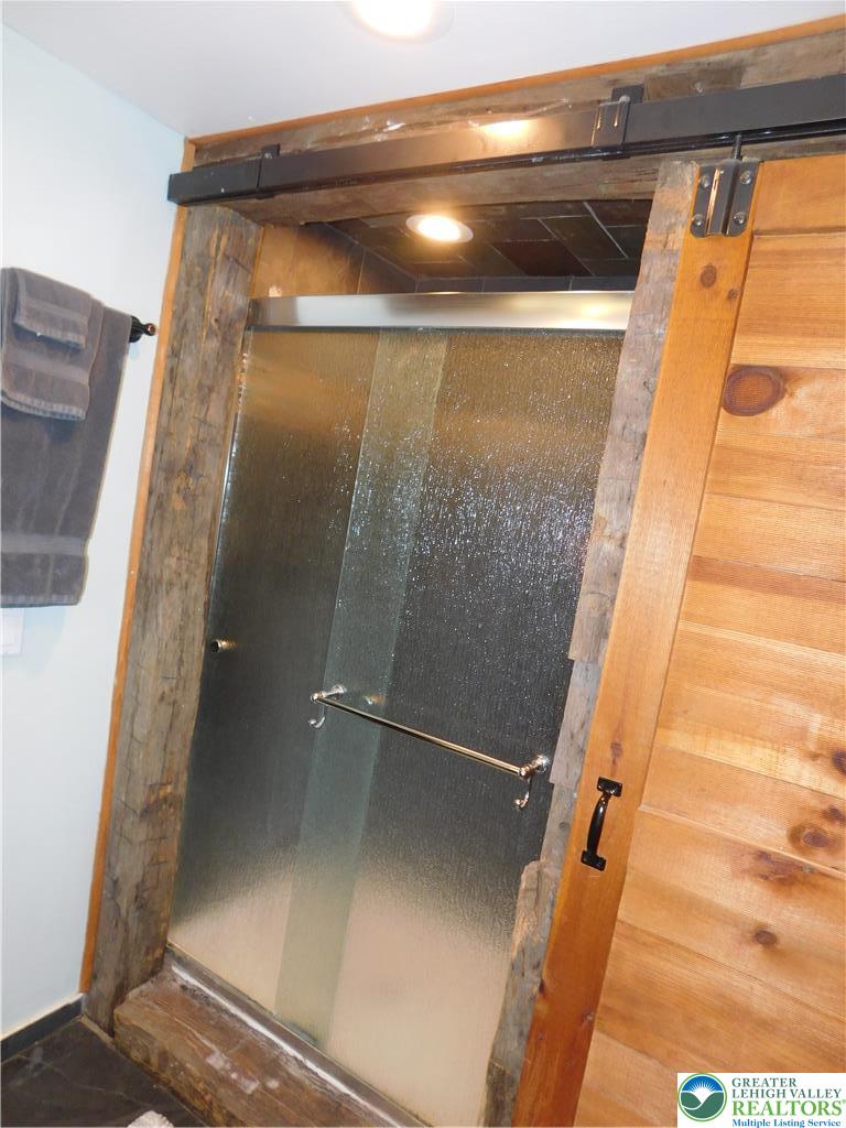 41 Reeder Street Mount Pocono, PA 18344 - Photo 29 of 41 A distinctive, waterfall glass shower door.