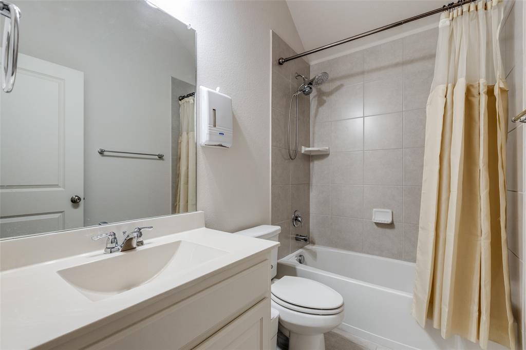 4217 Switchgrass Street Celina, TX 75009 - Photo 16 of 25 a bathroom with a sink toilet and shower
