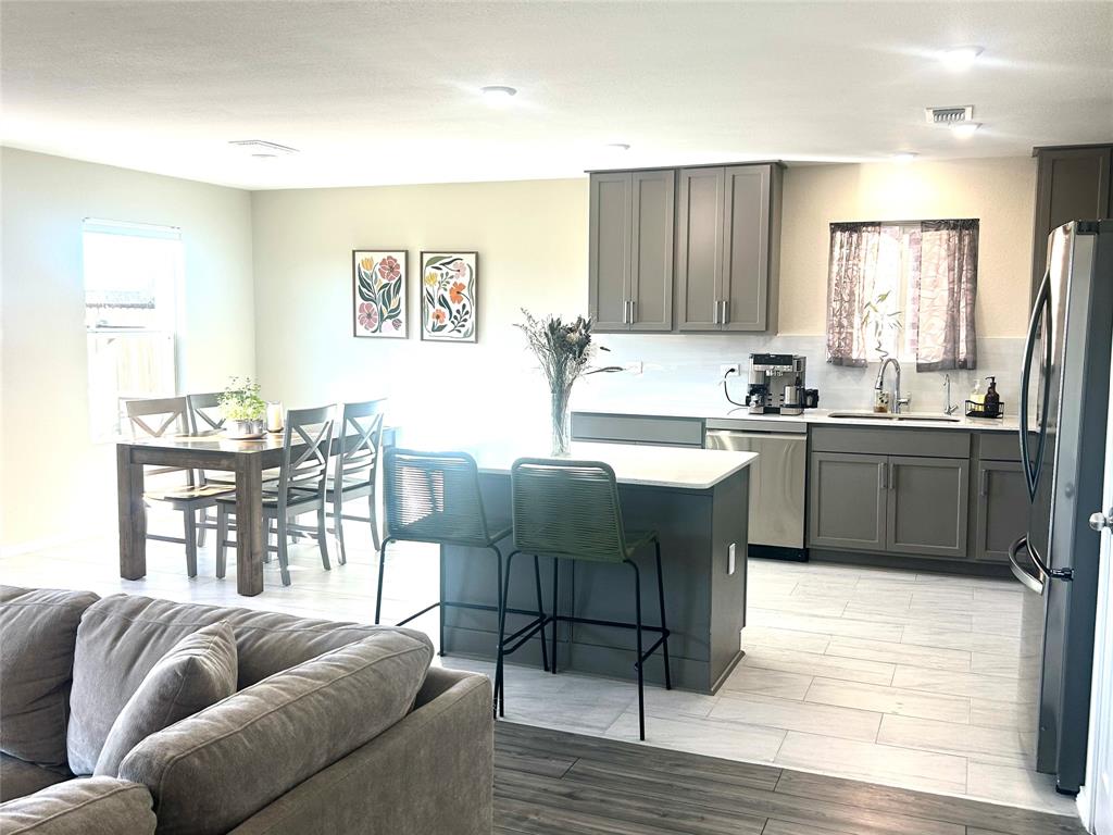 455 Manchester Street Van Alstyne, TX 75495 - Photo 4 of 21 Spacious kitchen and dining area