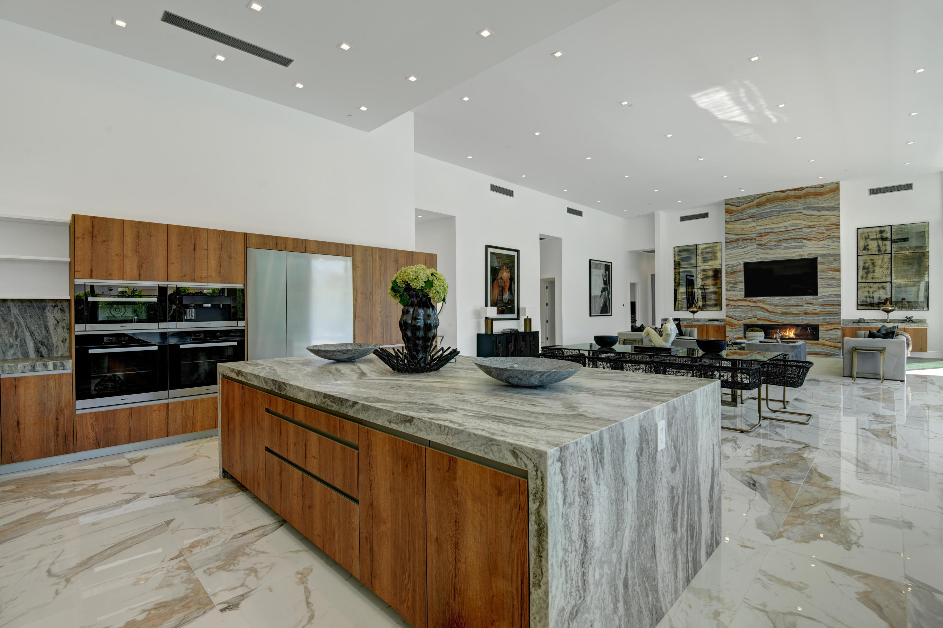 3 Bravo Court Rancho Mirage, CA 92270 - Photo 19 of 40 KITCHEN OUT TO LIVING ROOM OVER ISLAND