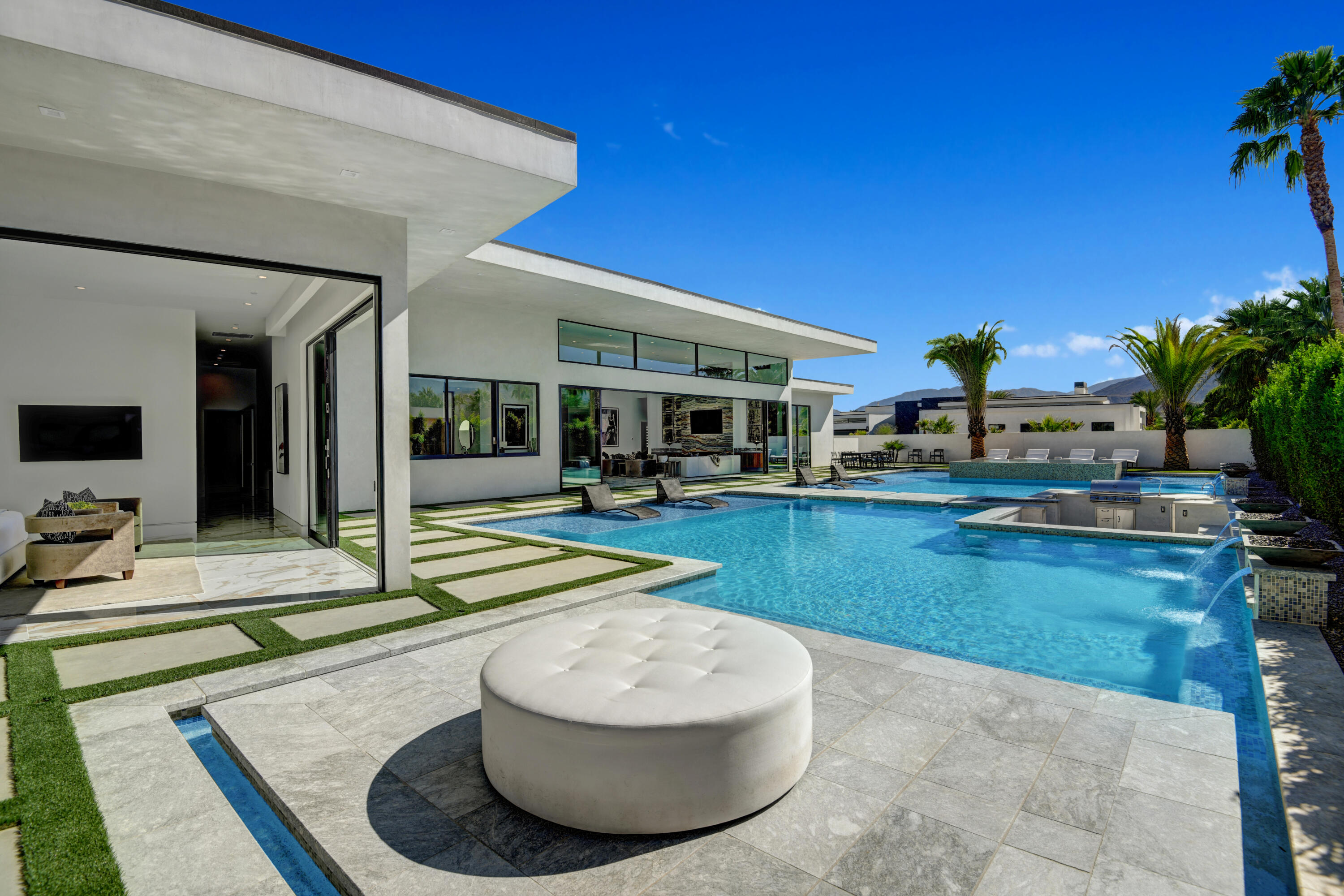 3 Bravo Court Rancho Mirage, CA 92270 - Photo 32 of 40 PRIMARY PATIO OTTOMAN TO POOL AND HOUSE