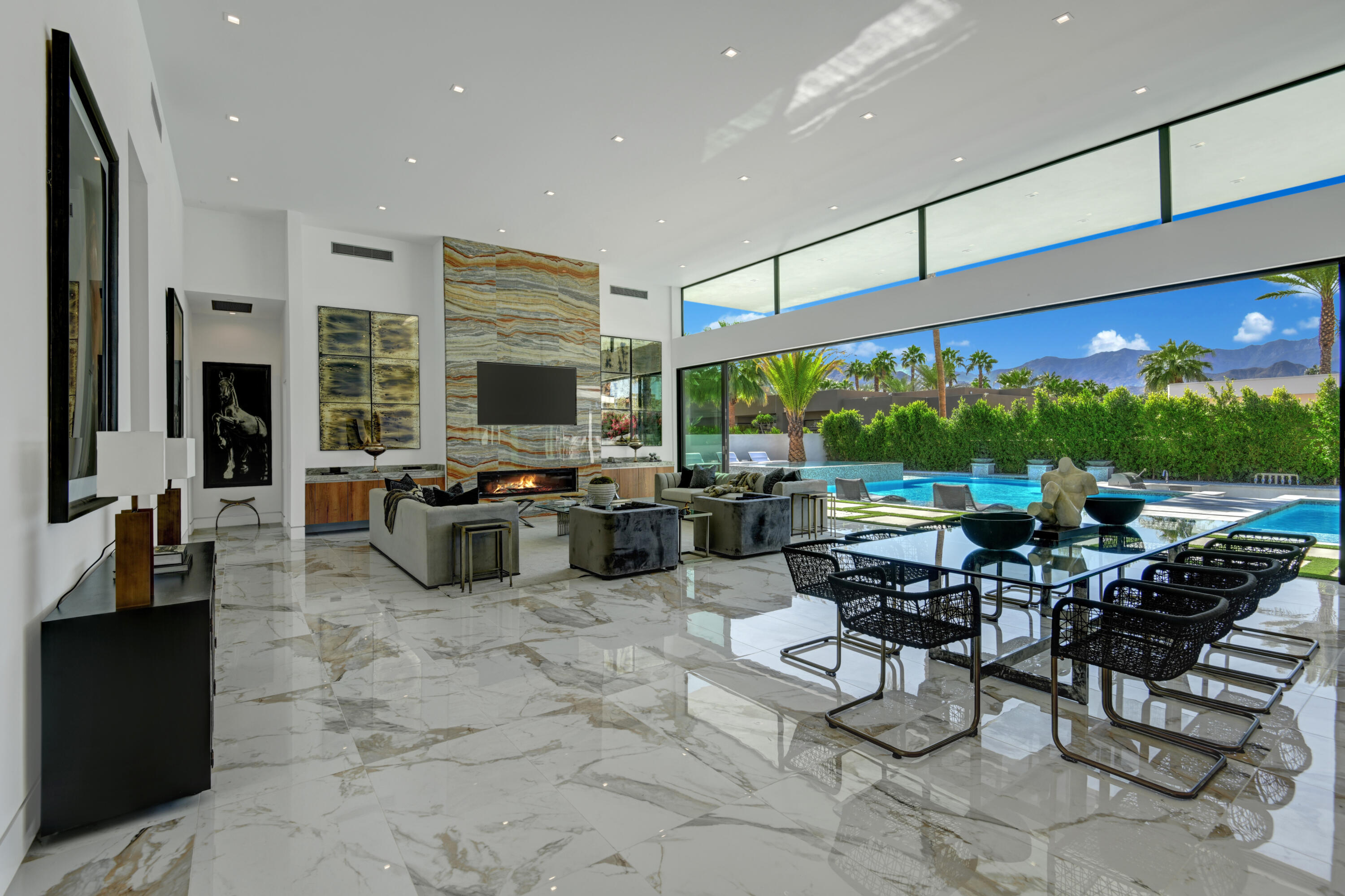 3 Bravo Court Rancho Mirage, CA 92270 - Photo 6 of 40 DINING ROOM AND LIVING ROOM TO VIEW