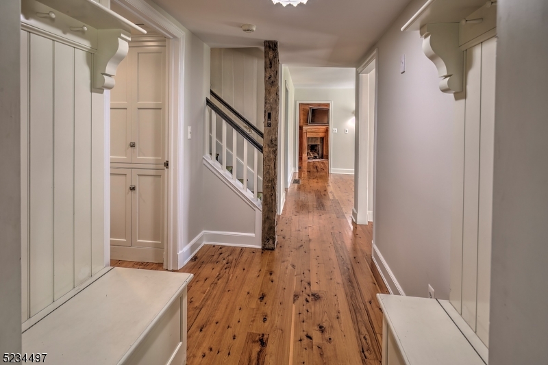 1815 Burnt Mills Road Bedminster, NJ 07921 - Photo 15 of 27 a view of hallway with wooden floor